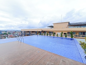 Outdoor pool - Best Homey And Restful Studio At Altuz Seturan Yogyakarta Apartment (Depok)