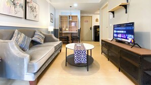 Apartment | Living area - Cozy Designed 2Br With Working Room At Meikarta Apartment (Cikarang)