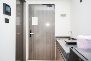 Studio | Private kitchen | Fridge, stovetop, rice cooker - Comfort Living Studio Apartment Carstensz Residence (Gading Serpong)