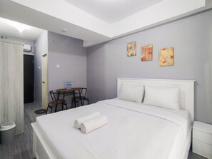 Studio | Free WiFi - Homey Grey Studio Apartment at Grand Asia Afrika Bandung By Travelio (Bandung)