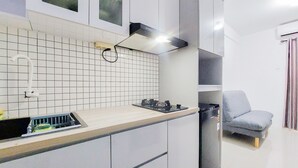 Apartment | Private kitchen - Homey And Comfort Living 2Br Urbantown Serpong Apartment (South Tangerang)
