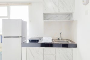 Private kitchen - Fully Furnished With Cozy Designed 2Br Serpong Garden Apartment (Cisauk)