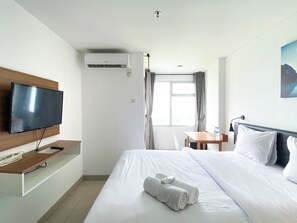 Studio | Free WiFi - Restful And Comfy Studio Enviro Apartment (Cikarang)