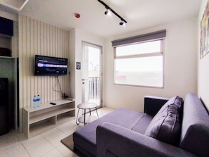 Living area - Spaicous 1Br With City View At Grand Asia Afrika Apartment (Bandung)