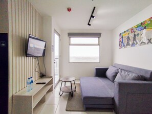 Living area - Spaicous 1Br With City View At Grand Asia Afrika Apartment (Bandung)