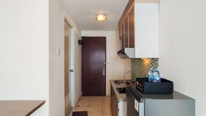 Studio | Private kitchen - Nice And Strategic Studio Room At Tamansari Panoramic (Bandung)