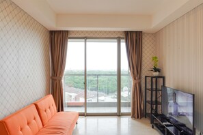 Apartment | Living area - Cozy And Modern Look 1Br Gold Coast Apartment (Jakarta)