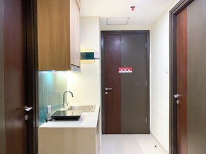 Appartamento | Cucina privata | Frigorifero, piano cottura