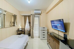 Studio | Free WiFi - Cozy And Strategic Studio At Transpark Cibubur Apartment (Depok)
