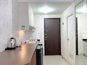 Studio | Eget kjøkken | Kjøleskap og kokeplater