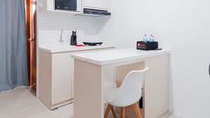 Apartment | Private kitchen - Comfort And Modern Look 2Br Loftvilles City Apartment (South Tangerang)