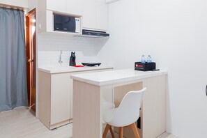 Private kitchen - Comfort And Modern Look 2Br Loftvilles City Apartment (South Tangerang)