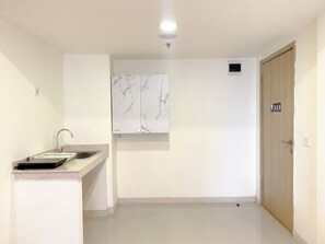 Apartment | Private kitchen - Comfortable 2Br With Working Room At Meikarta Apartment (Cikarang)