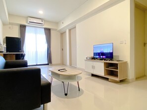 Apartment | Living area - Comfortable 2Br With Working Room At Meikarta Apartment (Cikarang)