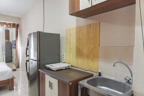 Studio | Private kitchen | Full-sized fridge, stovetop - Best Price And Restful Studio At Tifolia Apartment (Jakarta)