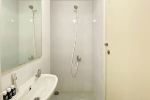 Studio | Bathroom | Shower, towels, soap, shampoo - Great Deal And Comfy Studio Tokyo Riverside Pik 2 Apartment (Teluknaga)