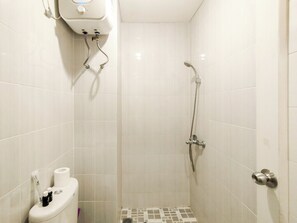 Studio | Bathroom | Shower, towels, soap, shampoo - Classic Studio (No Kitchen) With City View At Lodge Paskal Apartment (Bandung)