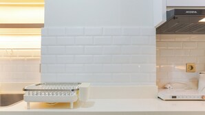 Studio | Private kitchen | Full-sized fridge, stovetop - Well Designed And Comfy Studio Transpark Cibubur Apartment (Bekasi)