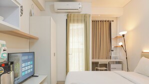 Studio | Free WiFi - Well Designed And Comfy Studio Transpark Cibubur Apartment (Bekasi)