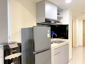 Apartment | Private kitchen | Full-sized fridge, stovetop - Modern Look 2Br Meikarta Apartment (Cikarang)