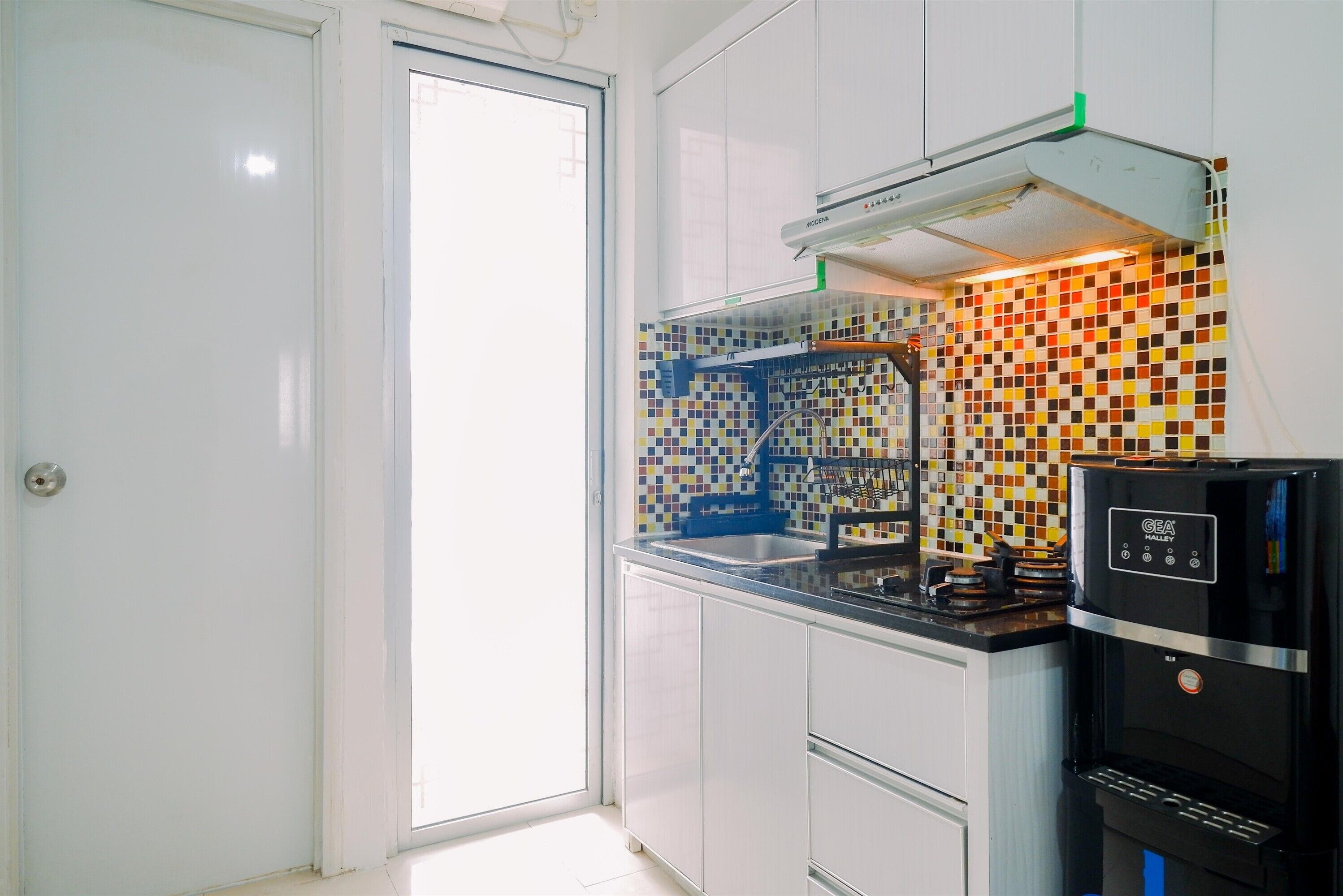 Apartamento | Cozinha privada | Geladeira grande, cooktop