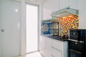 Departamento | Cocina privada | Refrigerador con congelador y parrilla de estufa 