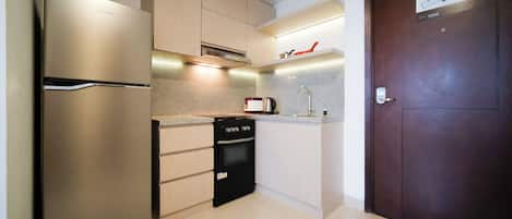 Studio | Private kitchen | Full-sized fridge, stovetop, electric kettle