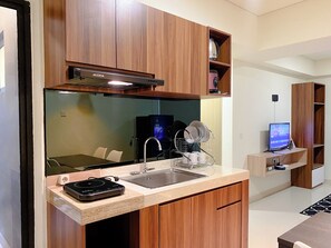 Apartment | Private kitchen | Full-size fridge, stovetop