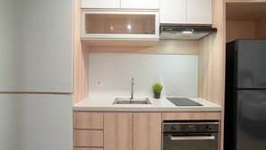 Studio | Private kitchen | Full-size fridge, stovetop, electric kettle