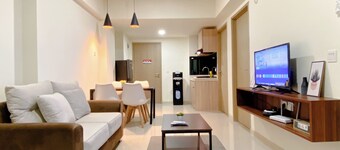 Homey 2Br With Work Space At Meikarta Apartment