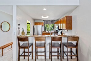 Condo, varias camas (Country Club Villas#326) | Cocina privada | Horno, tostadora y toallas de papel 
