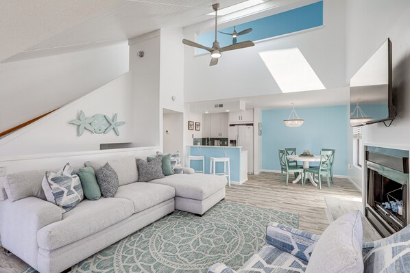 TV, fireplace - Bright & Airy Myrtle Beach Condo: 1 Block to Ocean (Myrtle Beach)