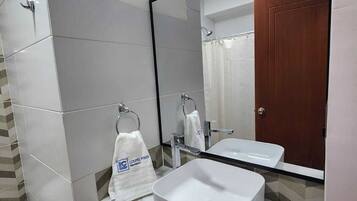 Superior Room, 1 Queen Bed, City View | Bathroom | Shower, hair dryer, towels, soap