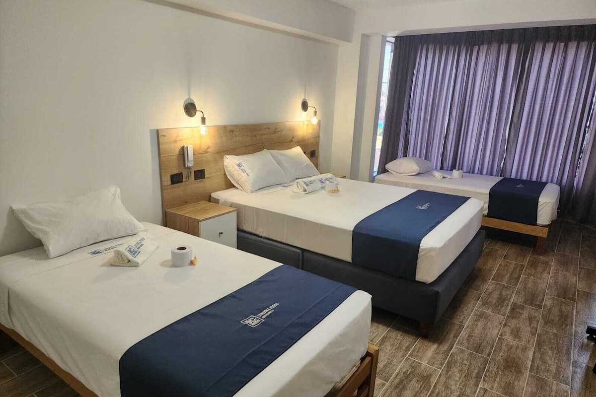 Premium bedding, down duvets, memory-foam beds, laptop workspace