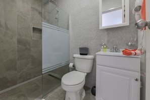 Hair dryer, towels, soap, toilet paper