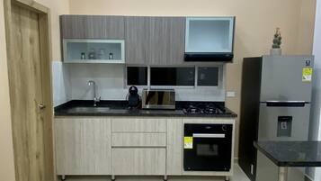 Elite Studio Suite, 2 Bedrooms, City View | Private kitchen | Full-size fridge, microwave, oven, stovetop