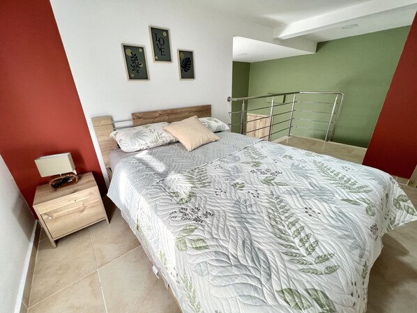 Junior Studio, 2 Bedrooms, City View | Pillowtop beds, blackout drapes, free WiFi, bed sheets