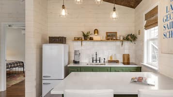 Fridge, microwave, stovetop, coffee/tea maker