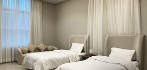 Design Apartment, 2 Bedrooms | 2 bedrooms, blackout drapes, iron/ironing board, free WiFi