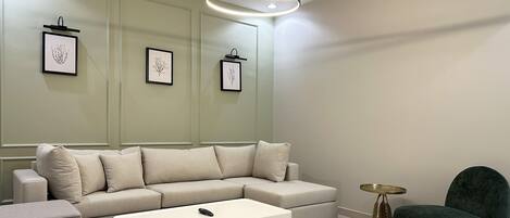 Design Apartment, 2 Bedrooms | Living area | Flat-screen TV