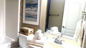 Hair dryer, bidet, towels, soap