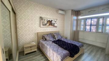 2 chambres, fer et planche à repasser, Wi-Fi, draps fournis