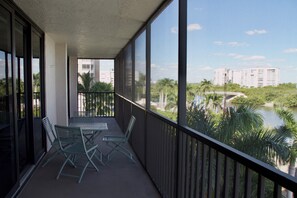 Outdoor dining - Private Beach Access Condo - Vanderbilt Beach (Naples)