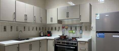 Design Apartment, 3 Bedrooms | Private kitchen | Electric kettle