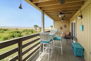 Outdoor dining - Ultimate Oceanview Condo with access to pools, tennis courts, and steps away from the Lighthouse. (Tybee Island)