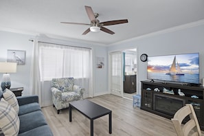 Smart TV, fireplace - Pet Friendly Destin Condo Across from Beach • Daily Beach Setup, Heated Pool (Destin)