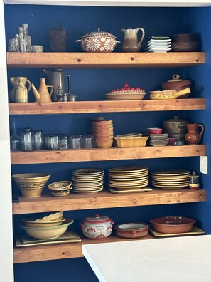 Kitchen essentials and dining items on display.