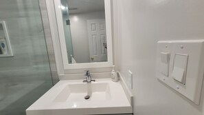Hair dryer, towels, soap, toilet paper