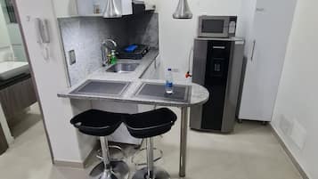 Full-size fridge, microwave, rice cooker, blender