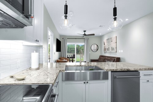 Welcome to “Gruene Lily Pad” a new river front condo steps away from Gruene! 